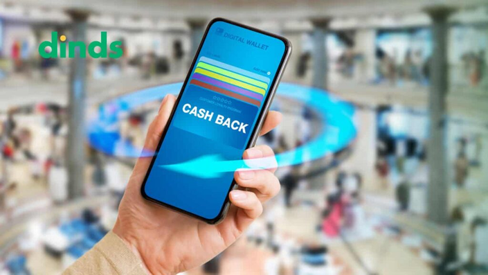 Uma imagem de um celular mostrando aplicativos de cashback e cupons de desconto, representando como as tecnologias podem ajudar a gastar menos dinheiro em compras diárias.
