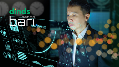homem analisando gráficos de investimento em tela futurística, com logos do Dinds e Banco Bari visíveis